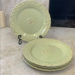 Four ceramic heavy dinner plates